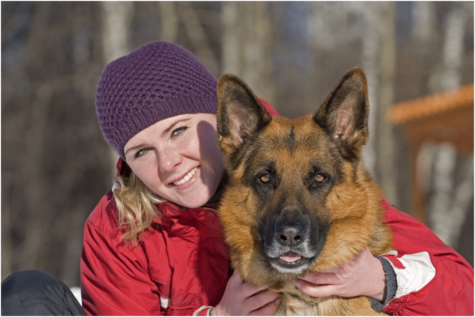 German Shepherd with her owner
